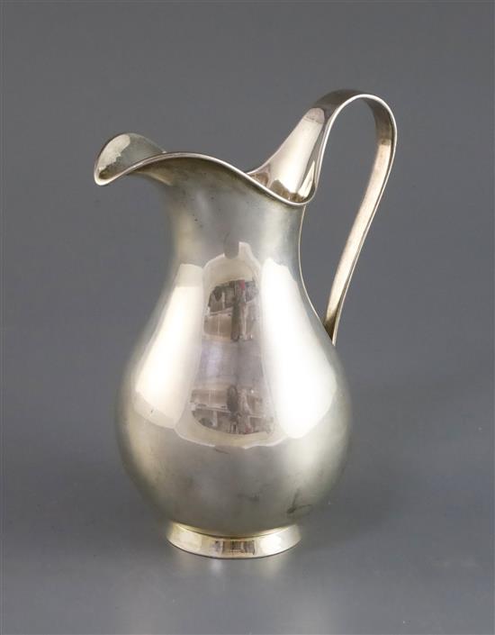 A 1930s Danish Kay Fisker sterling silver jug, 13.5 oz.